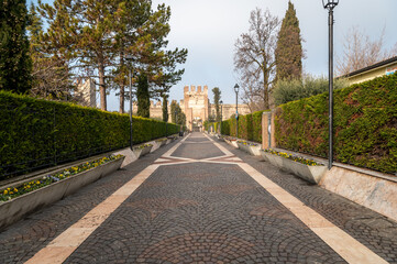 Gate of Lion of Saint Mark and tower of the walled town of Lazise on Garda Lake, Province of Verona, Venetor region, northern Italy