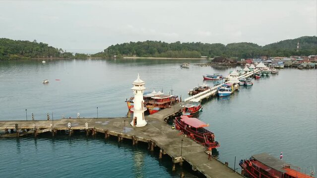 Beautiful aerial view of white lighthouse at the end of Bang Bao Pier in Ko Chang District, Trat, THAILAND.