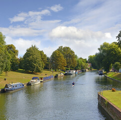 A picturesque view over the River Cam in Cambridge. Cambridge is a university city and the county...