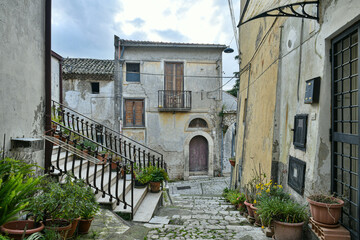 A narrow street among the old houses of Montesarchio, a village in the province of Benevento in Italy.