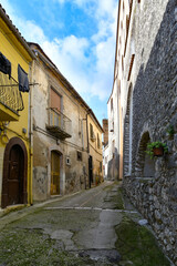 Fototapeta na wymiar A narrow street among the old houses of Montesarchio, a village in the province of Benevento in Italy.