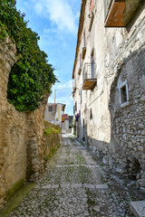 Fototapeta na wymiar A narrow street among the old houses of Montesarchio, a village in the province of Benevento in Italy.