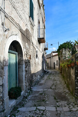 A narrow street among the old houses of Montesarchio, a village in the province of Benevento in...
