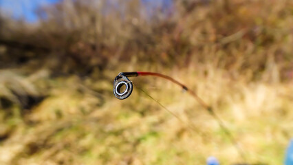 A tip top guide of a fishing rod.