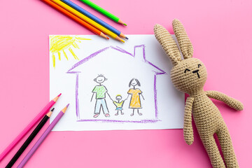 Childs drawing of happy family. Adoption concept