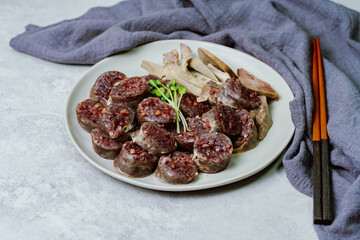 Sundae, Korean Blood Sausage : Pork intestines stuffed with glass noodles, vegetables, sweet rice,...