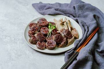 Sundae, Korean Blood Sausage : Pork intestines stuffed with glass noodles, vegetables, sweet rice,...