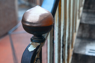 Balustrade with bronze handle . Interior handrail and stairs