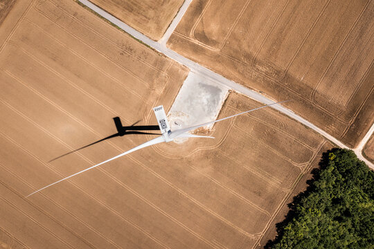wind turbine in the field, aerial shot from above