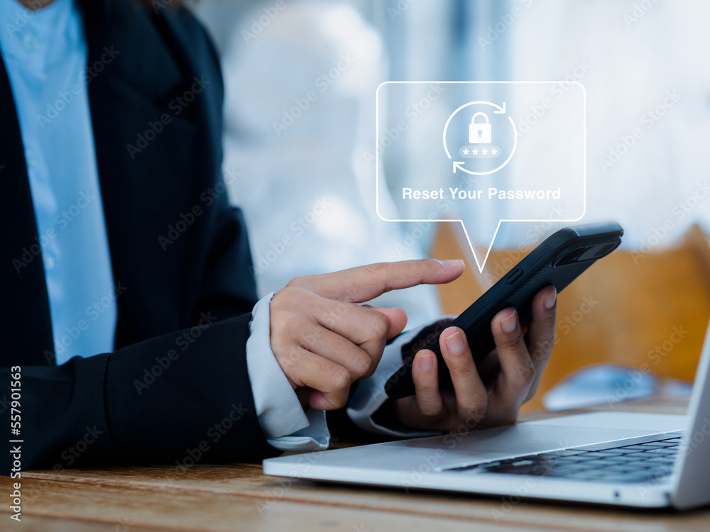 Poster reset password concept. lock icon, security code showing on smart mobile phone in hands of business 