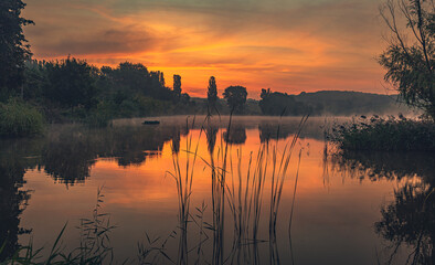 Naklejka premium Sunrise on river