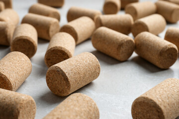 Wine bottle corks on light grey marble table, closeup