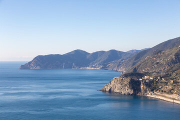Small touristic town on the rocky coast, Corniglia, Italy. Cinque Terre. Sunny Fall Season day.
