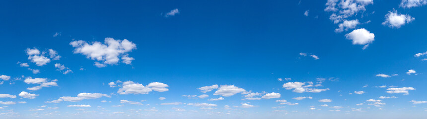 Blue Sky background with tiny Clouds. Panorama background