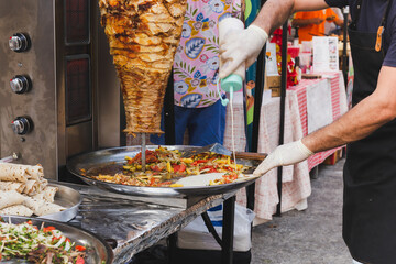 Traditional turkish food Doner kebab in a street vender.