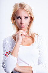 portrait of attractive blond woman on white background