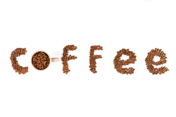 the word coffee written with coffee beans on a white background
