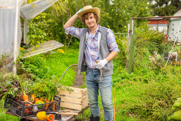 Contented agriculturist working on an organic farm