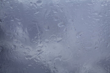 Drops of rain on glass