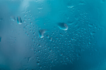 Drops of rain on glass