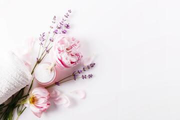 Fototapeta na wymiar Roses and lavender, salt, towel, spa background