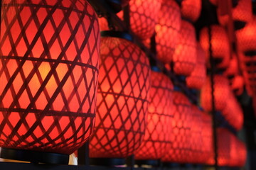 close up red retro Chinese lanterns at night