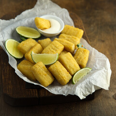 Homemade fish nuggets with lime