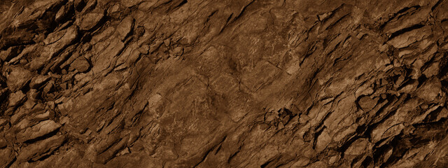 Red brown stone background with space for design. Rock surface texture. Cracked, crumbled, crushed....