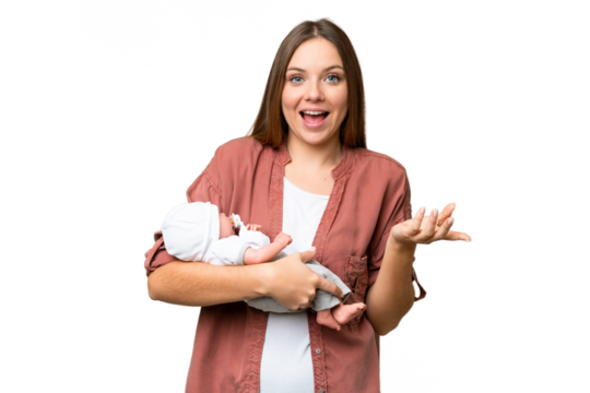 Young blonde woman  with her newborn baby over isolated chroma key background with shocked facial expression