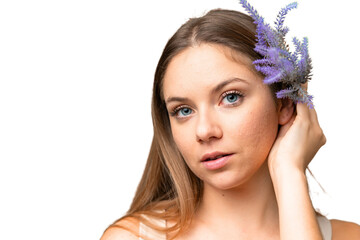 Young blonde woman over isolated chroma key background holding a lavender plant. Close up portrait