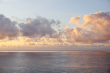 Sunset over the ocean in Madeira island in Portugal in pastel colours
