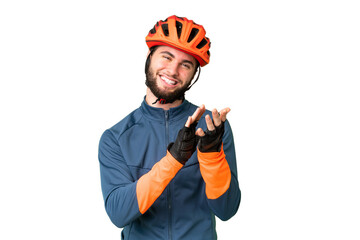 Young cyclist man over isolated chroma key background applauding after presentation in a conference