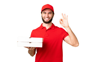 pizza delivery man with work uniform picking up pizza boxes over isolated chroma key background...