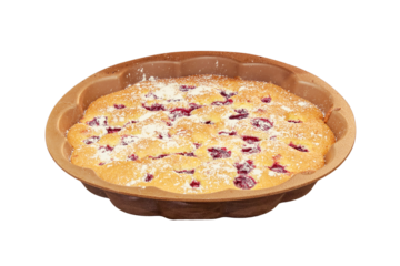 Berry pie in powdered sugar just out of the oven, isolated on a white background