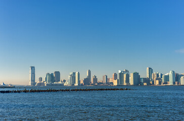 Naklejka premium Jersey City Across the Hudson River. View from New York Side. NJ, USA