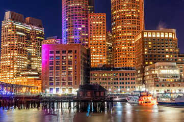 Boston Cityscape with River Bridge. Long Exposure Night Photography. Massachusetts, USA