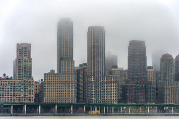 Obraz na płótnie Canvas Misty New York Cityscape in Background. NYC, USA.