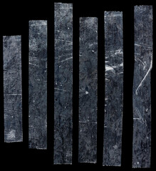 set of transparent adhesive tape or strips isolated on black background, crumpled plastic sticky...