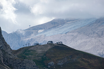 Great view of the Dolomites mountains with the glacier of the Marmolada in the background and a fantastic light and clouds condition, South Tyrol, Italy