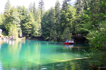 Fototapeta na wymiar The Blausee is a lake in Bernese Oberland, Kandergrund