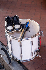 Shoes on Drum with drumsticks and beads, New Orleans, Louisiana