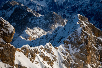 View from “Zugspitze“ the hightest mountain peak in the bavarian alps in Germany. Sunny winter...