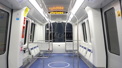 Fototapeta premium Europe, Italy , Milan 2023 - the new line 4 underground to Linate airport and Dateo subway stop - the automatic electric train without conductor - Public transport in downtown of the Lombardy city