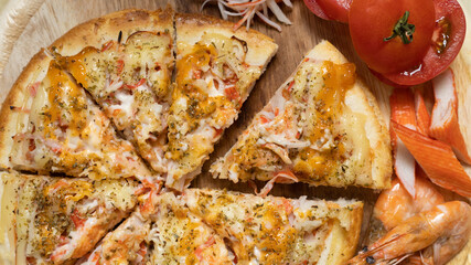 Homemade Seafood Pizza, Hot pizza big slices of cheese for lunch or dinner topped with Seafood Sauce, Template with delicious, Promotional poster for restaurant or pizza sale, Text space.