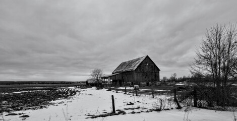 An old barn in a winter scene