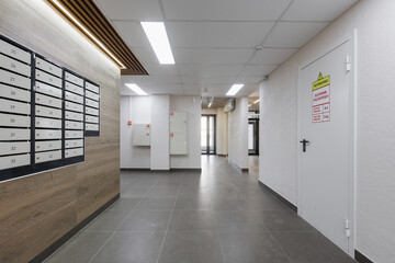 mailboxes in the lobby of an apartment building
