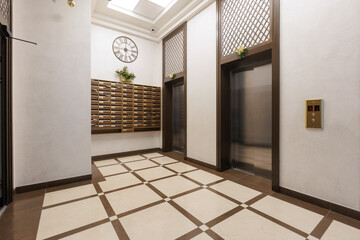 mailboxes in the lobby of an apartment building