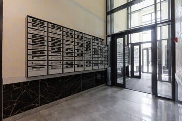 mailboxes in the lobby of an apartment building