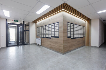 mailboxes in the lobby of an apartment building