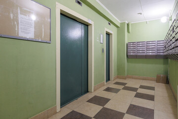 mailboxes in the lobby of an apartment building